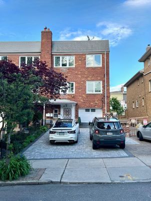 Attached, Exterior, Facade, Brick Facade, Condo Building