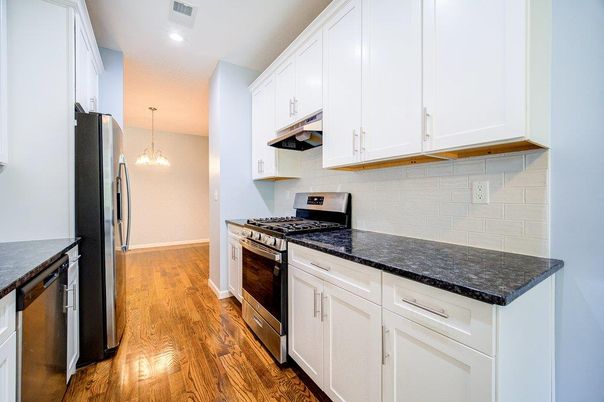 Interior, Kitchen, Pendant Lights, Recessed Lighting, Stainless Steel Appliances, Wood Texture Flooring