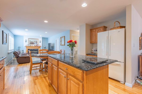 Dining room, Fireplace, Interior, Kitchen, Living room, Recessed Lighting, Wood Texture Flooring