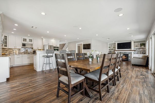 Dining room, Fireplace, Interior, Kitchen, Recessed Lighting, Wood Texture Flooring