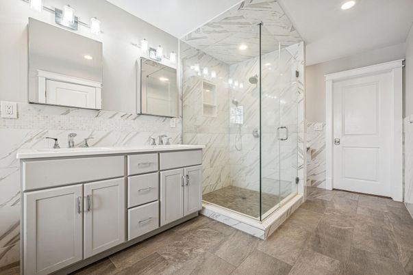 Bathroom, Dual Sink Vanities, Glass Shower, Interior, Marble Walls, Recessed Lighting
