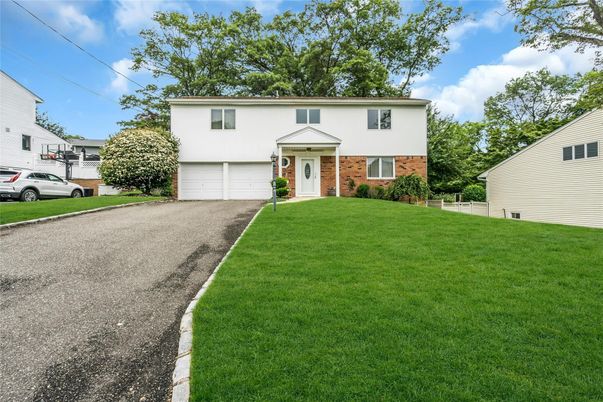 Attached, Exterior, Facade, Brick Facade, Raised Ranch