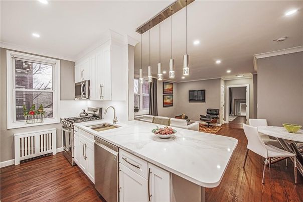 Dining room, Interior, Kitchen, Pendant Lights, Recessed Lighting, Stainless Steel Appliances, Wood Texture Flooring