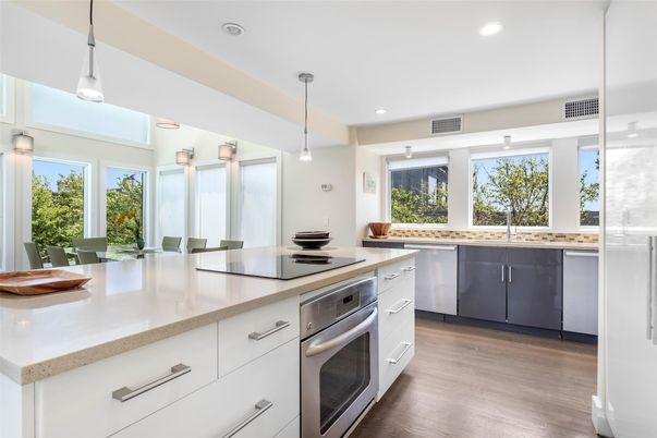 Dining room, Interior, Kitchen, Pendant Lights, Recessed Lighting, Stainless Steel Appliances, Wood Texture Flooring