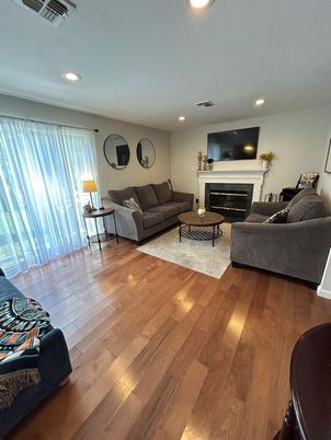 Fireplace, Interior, Living room, Recessed Lighting, Wood Texture Flooring