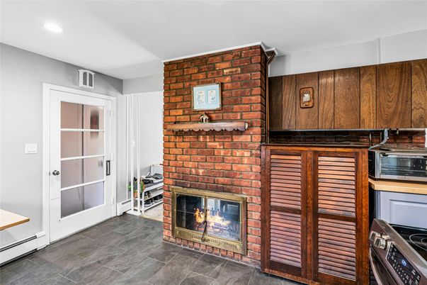 Fireplace, Interior, Kitchen, Recessed Lighting, Stone Walls