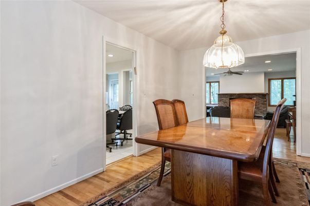 Dining room, Fireplace, Interior, Pendant Lights, Recessed Lighting, Wood Texture Flooring