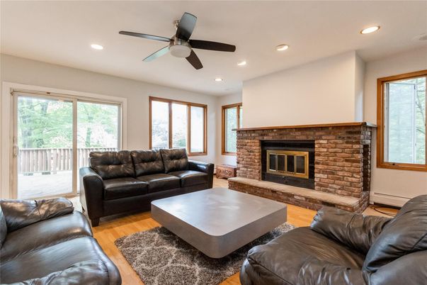 Fireplace, Interior, Living room, Recessed Lighting, Wood Texture Flooring