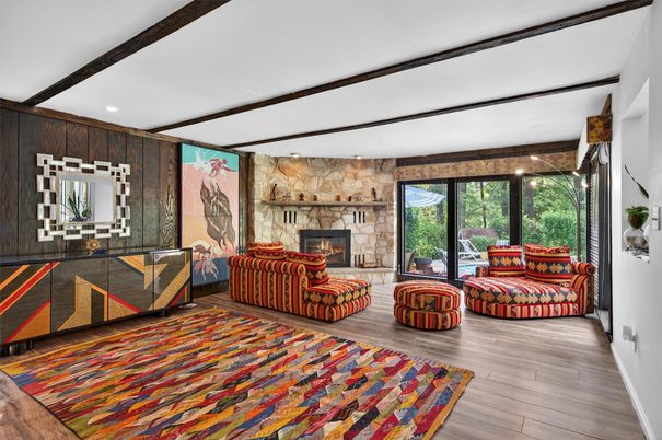 Fireplace, Interior, Living room, Recessed Lighting, Stone Walls, Wood Texture Flooring