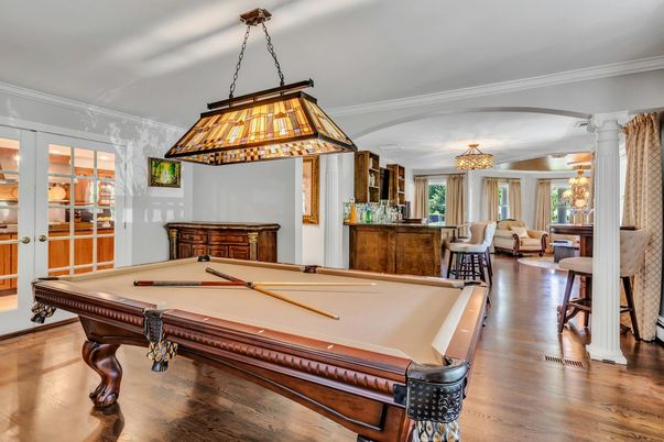 Billiard Table, Chandelier, Game Room, Interior, Living room, Pendant Lights, Wood Texture Flooring