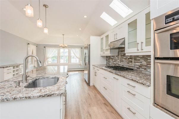Chandelier, Interior, Kitchen, Pendant Lights, Recessed Lighting, Stainless Steel Appliances, Wood Texture Flooring