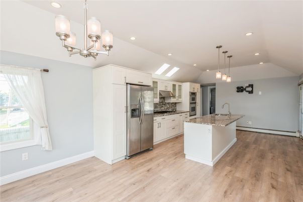 Chandelier, Interior, Kitchen, Pendant Lights, Recessed Lighting, Stainless Steel Appliances, Wood Texture Flooring