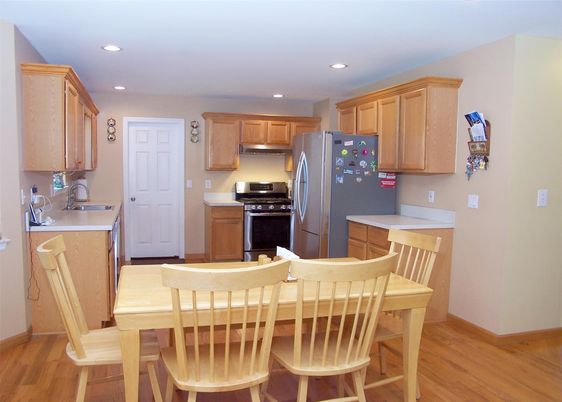 Dining room, Interior, Kitchen, Recessed Lighting, Stainless Steel Appliances, Wood Texture Flooring