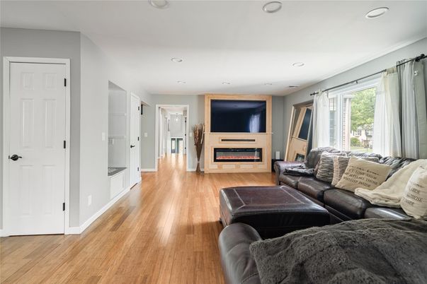 Fireplace, Interior, Living room, Recessed Lighting, Wood Texture Flooring