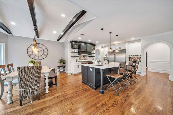 Dining room, Interior, Kitchen, Pendant Lights, Recessed Lighting, Stainless Steel Appliances, Wood Texture Flooring