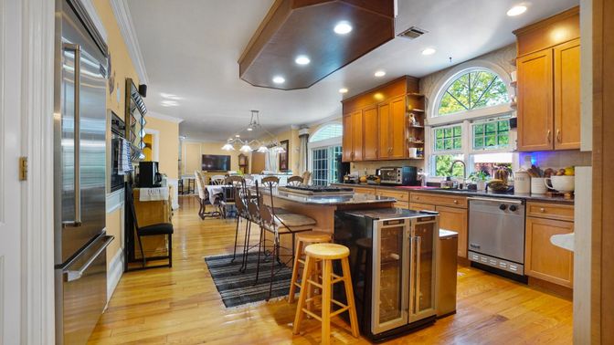 Dining room, Interior, Kitchen, Pendant Lights, Recessed Lighting, Stainless Steel Appliances, Wood Texture Flooring
