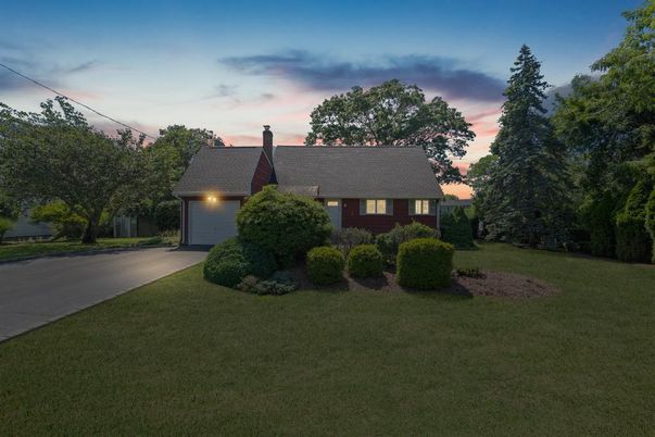 Attached, Backyard, Exterior, Facade, Brick Facade, Cape Cod