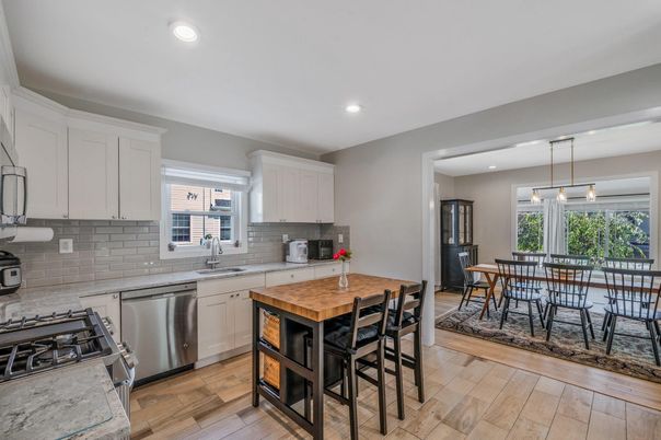 Dining room, Interior, Kitchen, Pendant Lights, Recessed Lighting, Stainless Steel Appliances, Wood Texture Flooring
