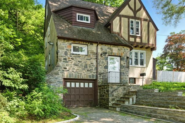 Attached, Exterior, Facade, Tudor Revival