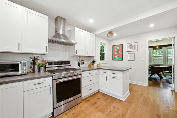 Dining room, Interior, Kitchen, Recessed Lighting, Stainless Steel Appliances, Wood Texture Flooring