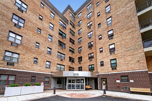 Exterior, Facade, Brick Facade, Condo Building
