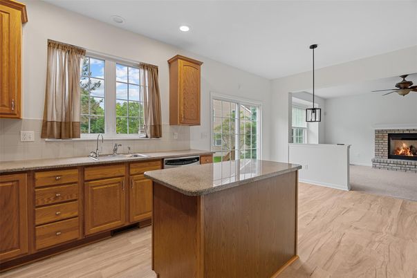Fireplace, Interior, Kitchen, Pendant Lights, Recessed Lighting, Wood Texture Flooring