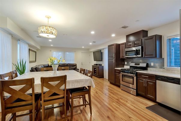 Dining room, Interior, Kitchen, Recessed Lighting, Stainless Steel Appliances, Wood Texture Flooring