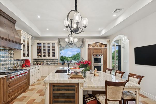 Chandelier, Dining room, Interior, Kitchen, Pendant Lights, Recessed Lighting, Stainless Steel Appliances