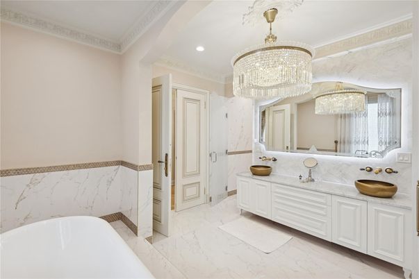 Bathroom, Chandelier, Dual Sink Vanities, Interior, Marble, Marble Walls, Recessed Lighting