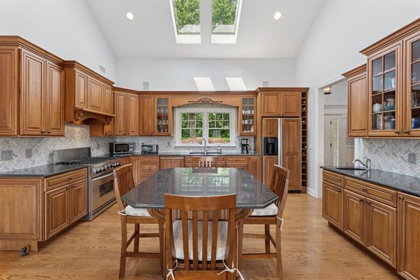 Dining room, Interior, Kitchen, Recessed Lighting, Stainless Steel Appliances, Wood Texture Flooring