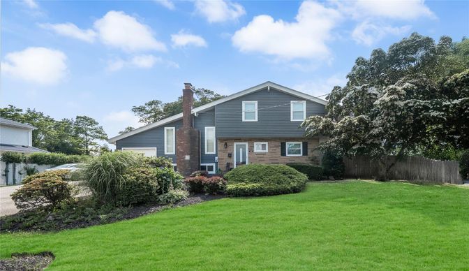 Attached, Backyard, Exterior, Facade, Brick Facade, Split Level