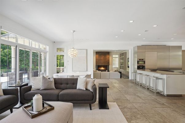 Chandelier, Dining room, Fireplace, Interior, Kitchen, Living room, Pendant Lights, Recessed Lighting, Stainless Steel Appliances