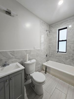 Bathroom, Interior, Marble Walls, Recessed Lighting, Wood Texture Flooring
