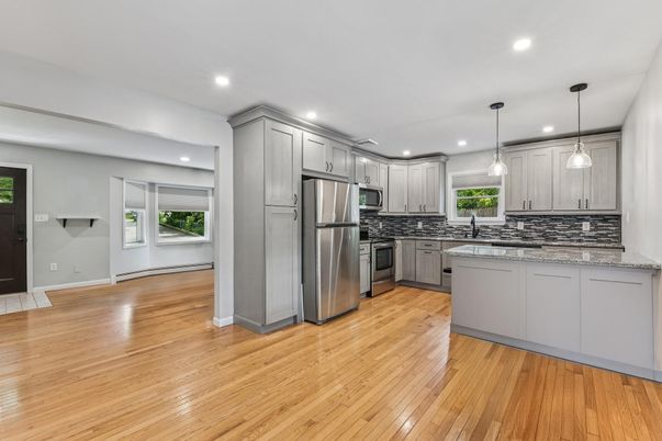 Interior, Kitchen, Pendant Lights, Recessed Lighting, Stainless Steel Appliances, Wood Texture Flooring