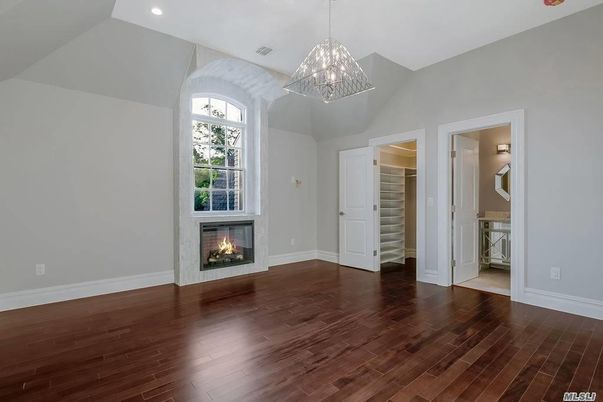 Empty room, Fireplace, Interior, Pendant Lights, Recessed Lighting, Wood Texture Flooring