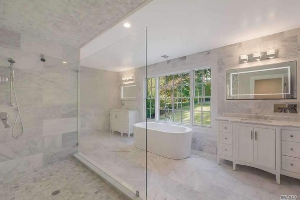 Bathroom, Dual Sink Vanities, Free Standing Baths, Glass Shower, Interior, Marble, Marble Walls, Recessed Lighting