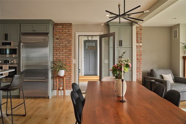 Dining room, Interior, Kitchen, Pendant Lights, Recessed Lighting, Stainless Steel Appliances, Stone Walls, Wood Texture Flooring