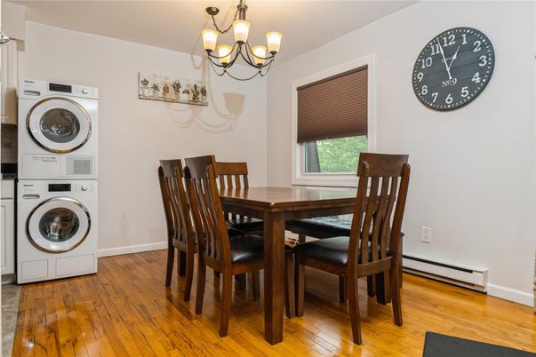 Chandelier, Dining room, Interior, Utility Closets, Washer, Wood Texture Flooring