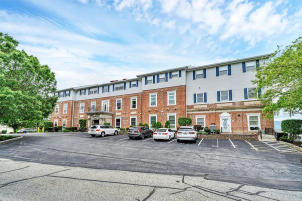Exterior, Facade, Brick Facade, Condo Building