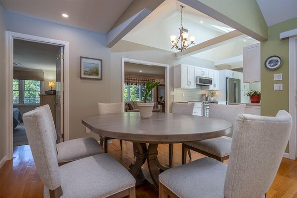 Chandelier, Dining room, Interior, Kitchen, Recessed Lighting, Stainless Steel Appliances, Wood Texture Flooring