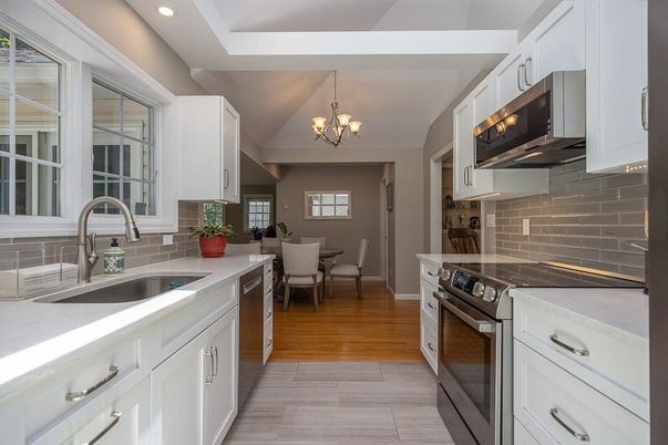 Chandelier, Dining room, Interior, Kitchen, Recessed Lighting, Stainless Steel Appliances, Wood Texture Flooring