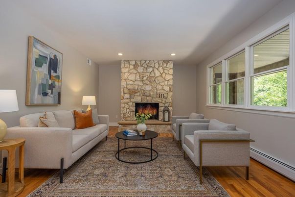 Fireplace, Interior, Living room, Recessed Lighting, Stone Walls, Wood Texture Flooring