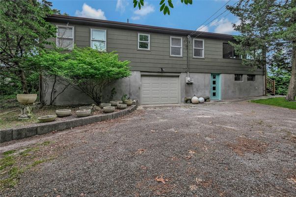 Attached, Exterior, Facade, Raised Ranch