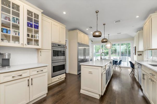 Dining room, Interior, Kitchen, Pendant Lights, Recessed Lighting, Stainless Steel Appliances, Wood Texture Flooring