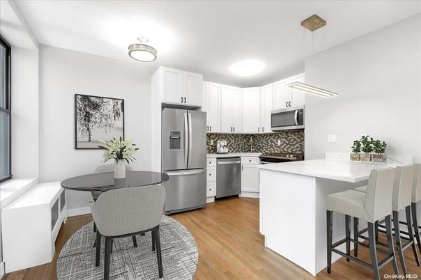 Dining room, Interior, Kitchen, Pendant Lights, Stainless Steel Appliances, Wood Texture Flooring