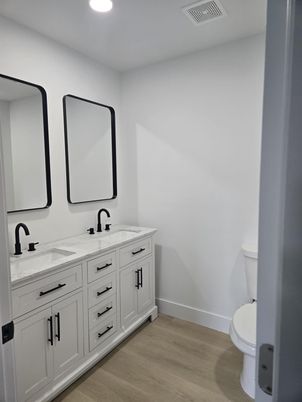 Bathroom, Dual Sink Vanities, Interior, Recessed Lighting, Wood Texture Flooring