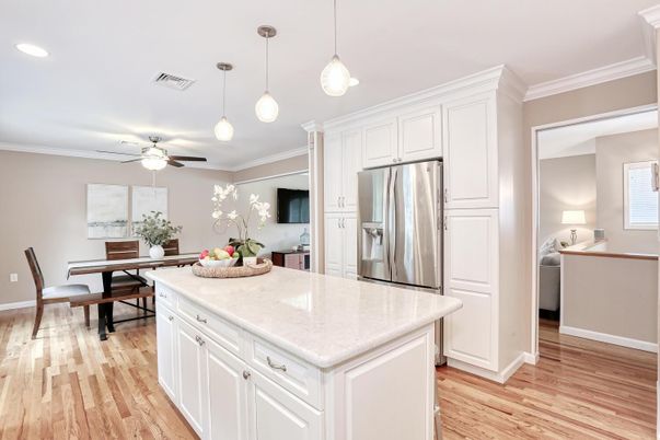 Dining room, Interior, Kitchen, Pendant Lights, Recessed Lighting, Stainless Steel Appliances, Wood Texture Flooring