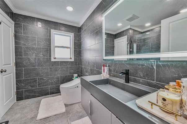 Bathroom, Dual Sink Vanities, Interior, Marble Walls, Recessed Lighting