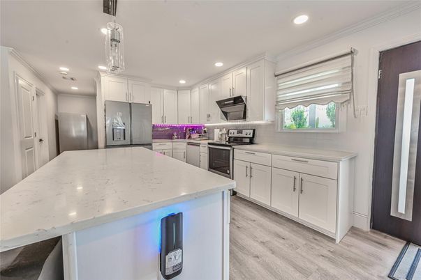 Interior, Kitchen, Pendant Lights, Recessed Lighting, Stainless Steel Appliances, Wood Texture Flooring