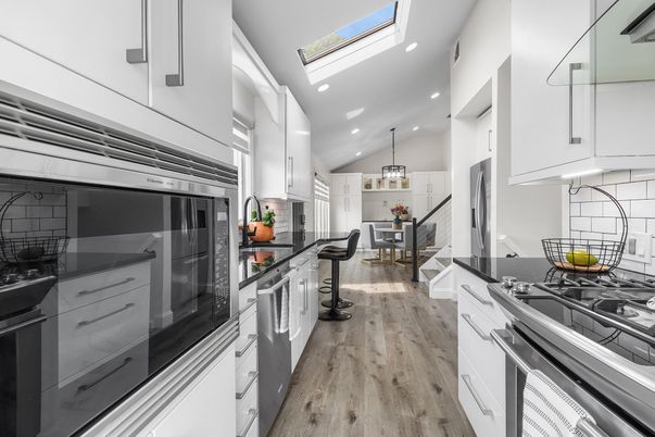 Dining room, Interior, Kitchen, Pendant Lights, Recessed Lighting, Stainless Steel Appliances, Wood Texture Flooring